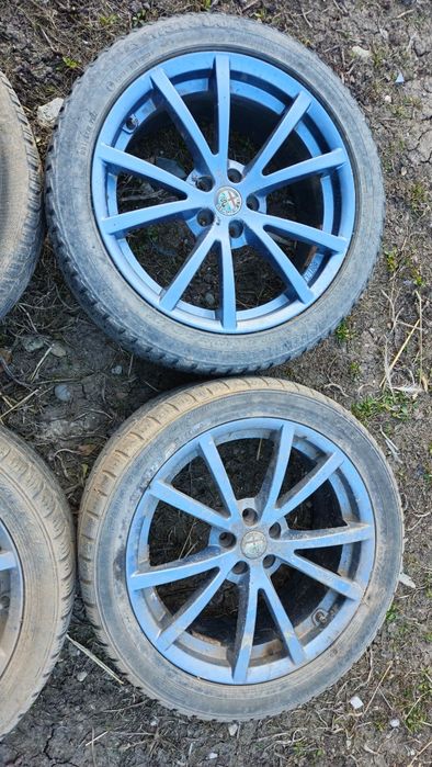 Jante aliaj 17” Alfa Romeo + anvelope 225/45 R17 M+S – set 4 buc