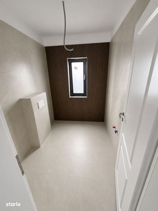 Casa cu 4 camere, curte de 400 mp, nouă în Clinceni