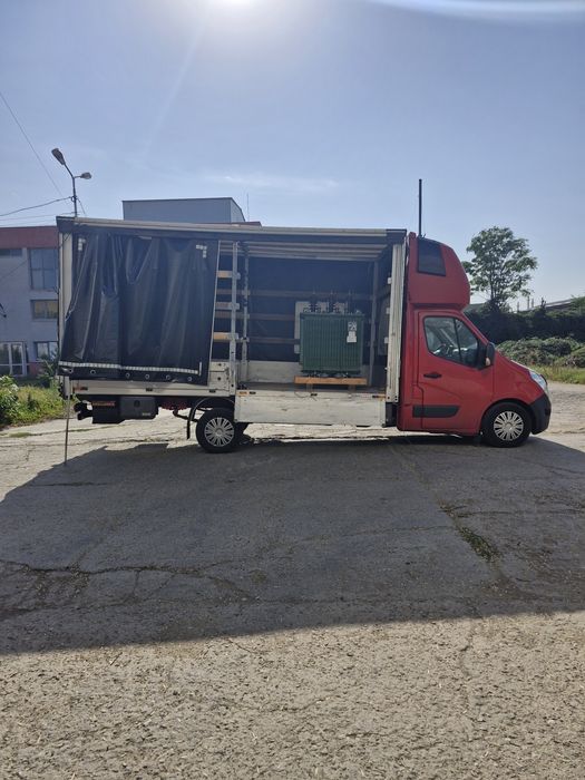 Transport marfă cu dubă prelată și lift hidraulic
Transport