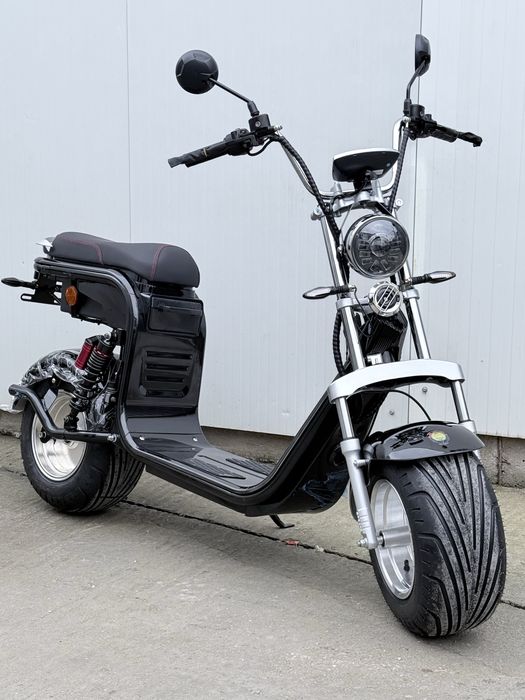 Scuter electric cu cartela 2025