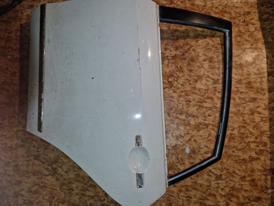 Дверь ниссан альмера