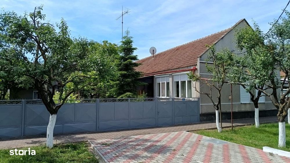 Casa individuala -Carani+teren 745 mp-strada asfaltata