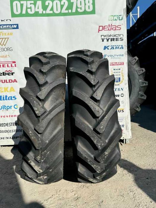 Cauciucuri marca BKT 13.6-28 cu 8 pliuri pentru tractor spate