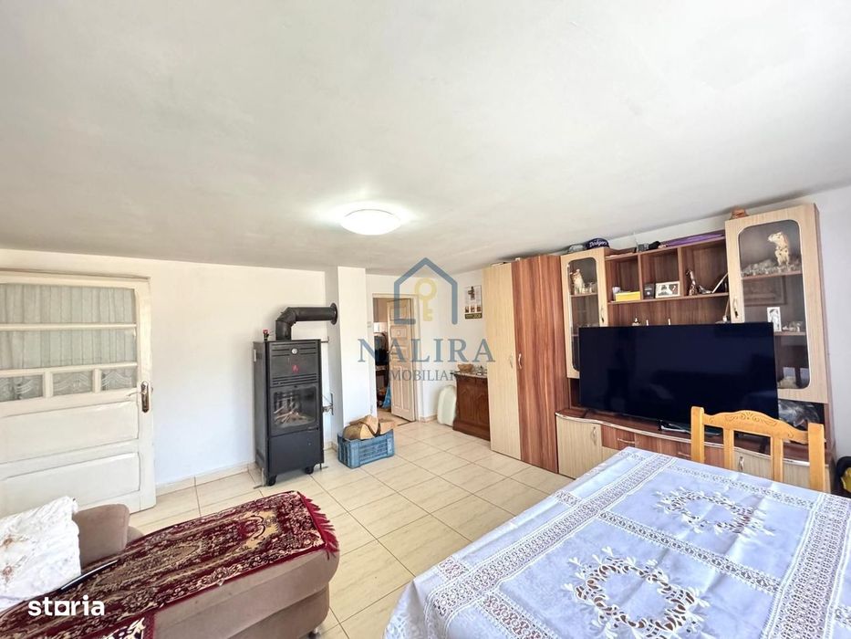 Casa de caramida de vanzare Surdesti cu teren intravilan 5000mp