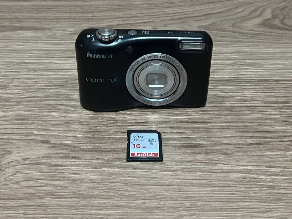Aparat foto Nikon Coolpix L29 printeaza data si ora,perfect statii itp