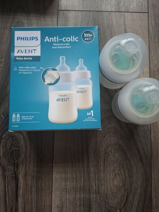 4бр. Шишета Philips avent и Поставка за чаша