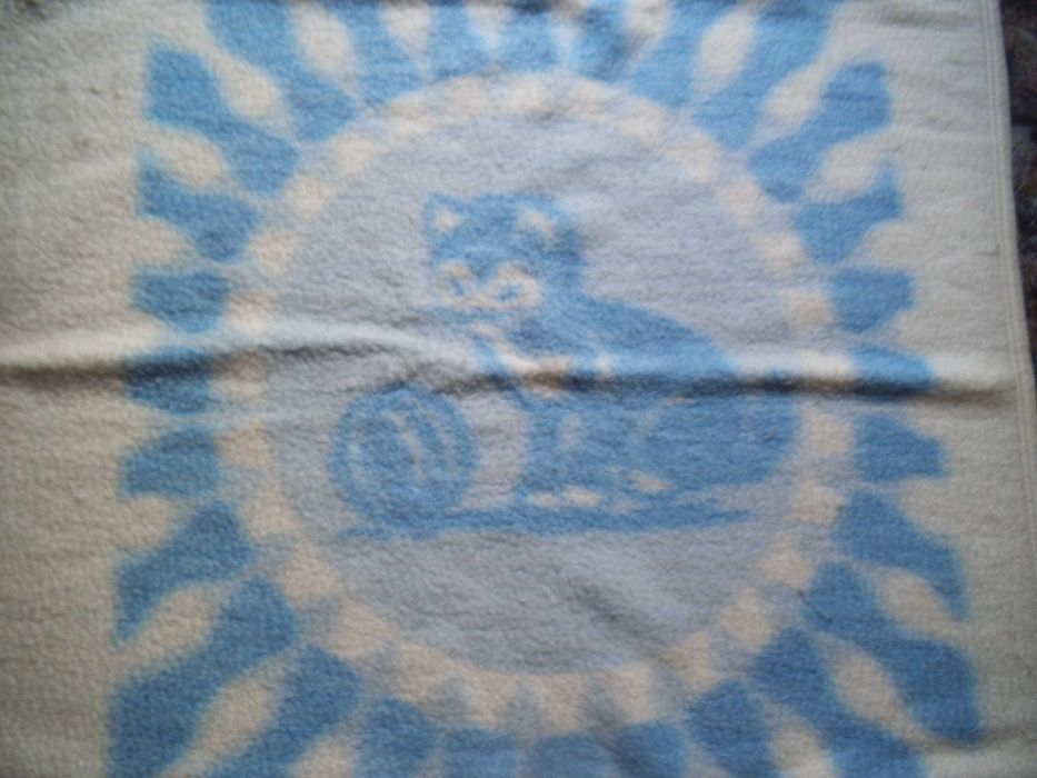 Вълнено и синтетично одеяло