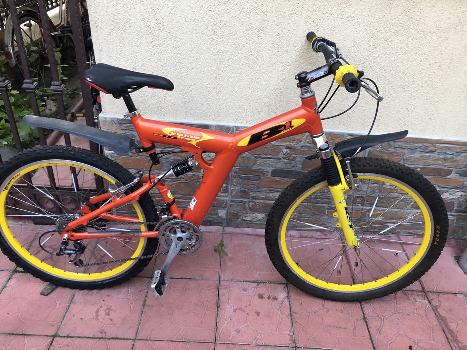 Bicicleta suspensii fata si spate