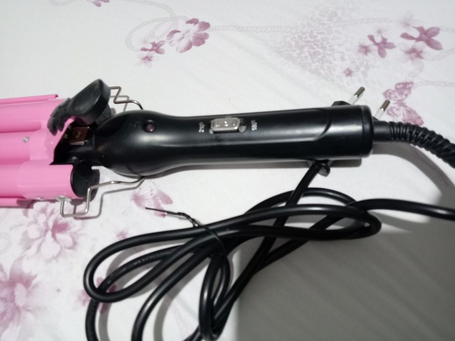 Vând placa pentru bucle e noua