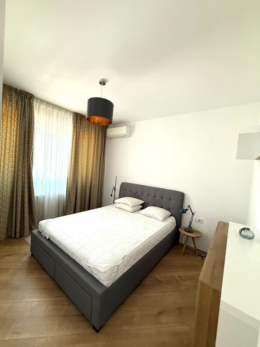 Ofer spre închiriere apartament cu 2 camere + loc de parcare subteran