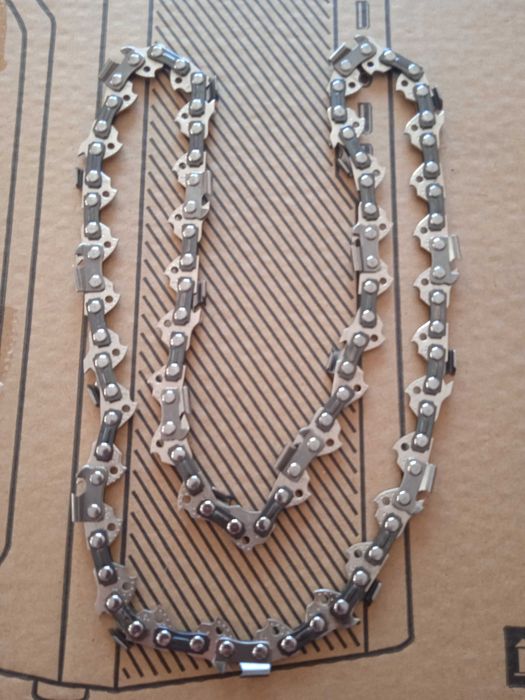 Цепь для цепной электропилы.