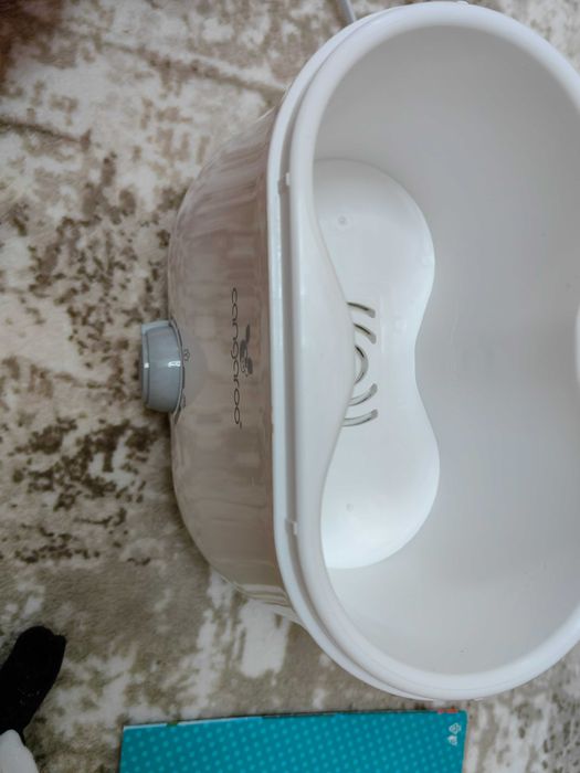 Уред за затопляне на шишета