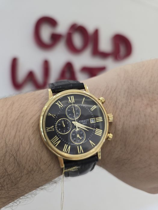 Продам золотые часы Tissot