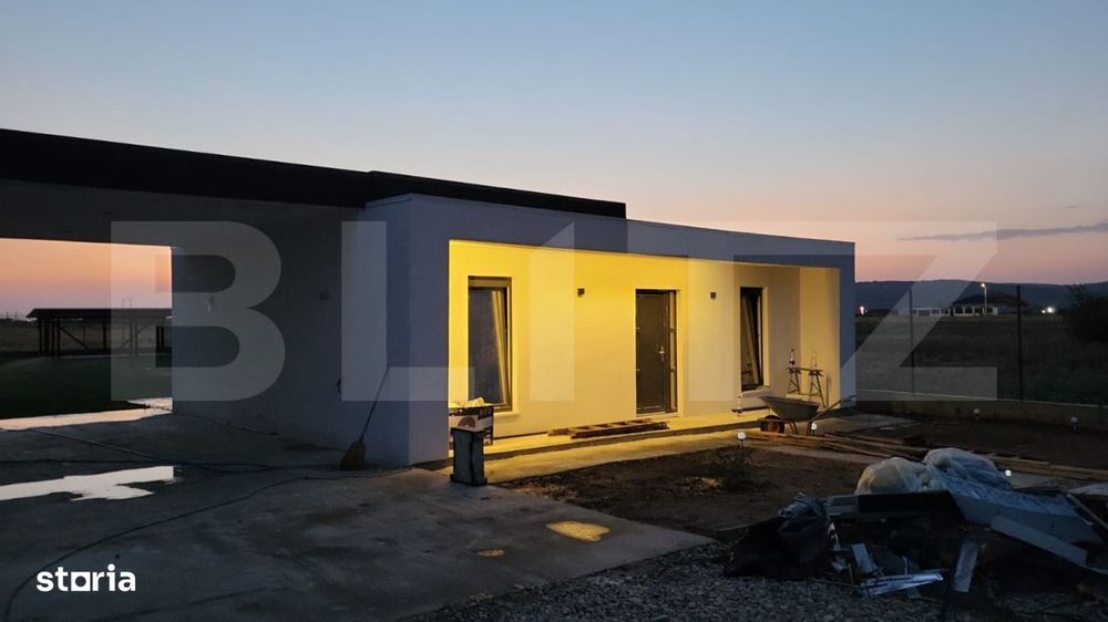 Casa individuala Osorhei cu filigorie si gard imprejmuire
