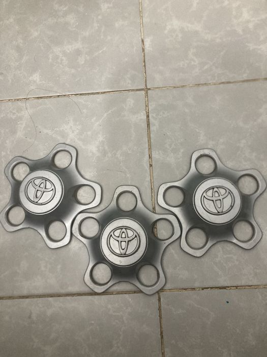 Колпаки на диски таета