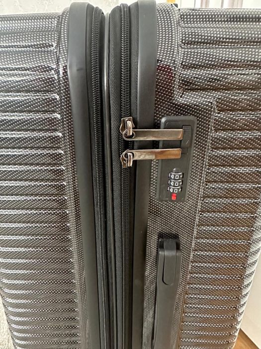 Чемодан на колесиках