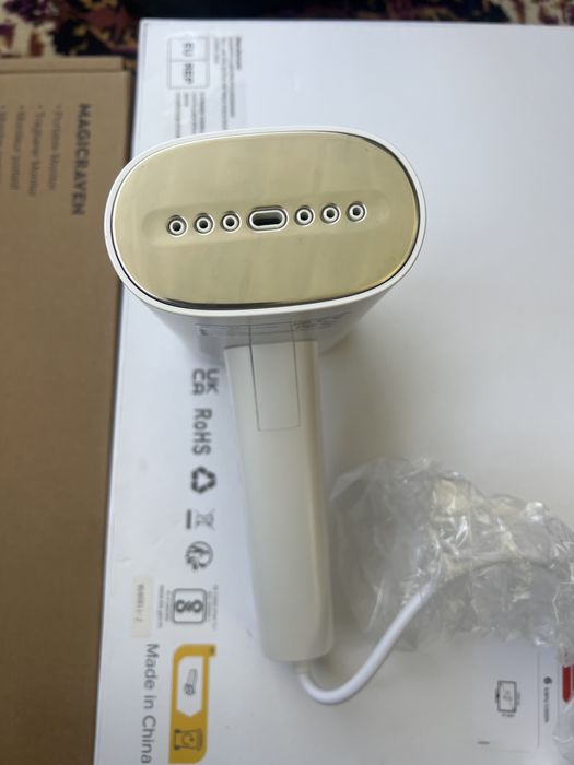 Aparat de călcat vertical portabil Simplus.