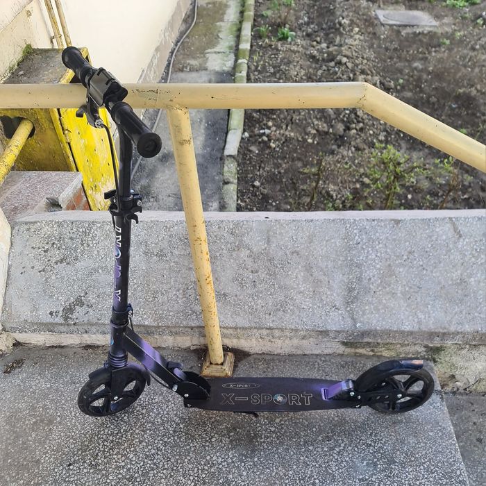 Trotineta cu ghidon reglabil