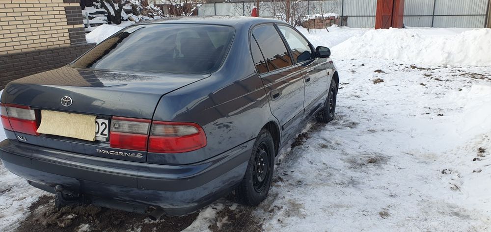 Продам машину тойота карина е