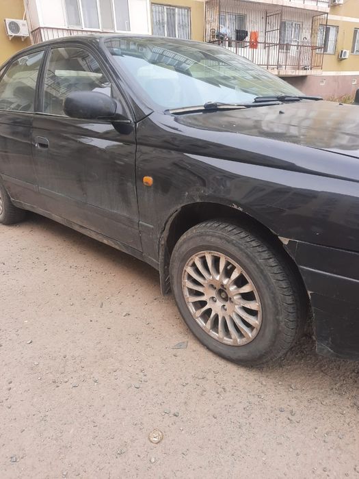 Тойота карина е 1.6