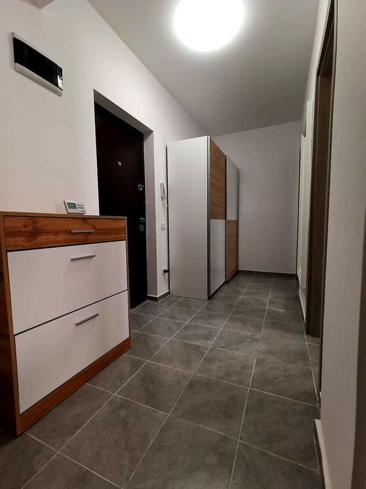 Apartament doua camere cu loc de parcare si curte proprii