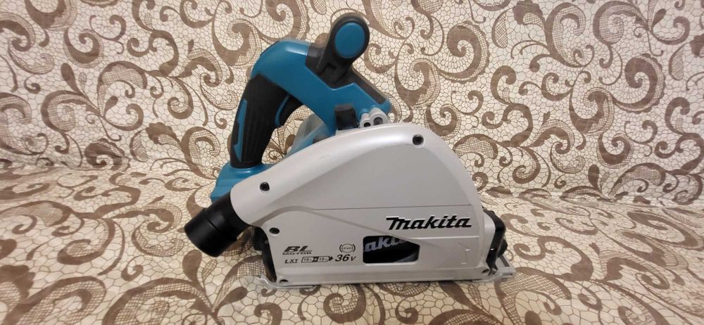 Makita DSP600 - Ferastru circular 6300rpm Li-Ion, 18 V, - Ah, 165 mm, motor fara perii ca nou+disc