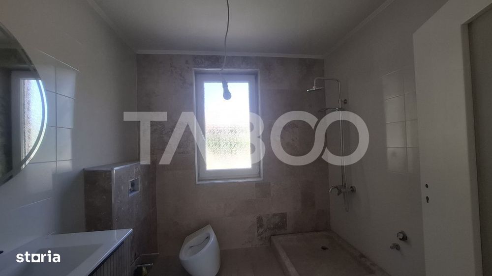 Casa de vanzare 405 mp utili 2 garaje 250 mp terase Slimnic Sibiu