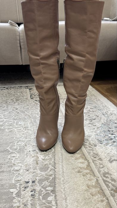 Продам новые сапоги