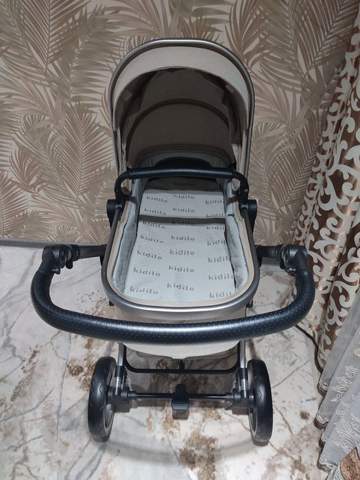 Детская коляска с автокресло Kidilo