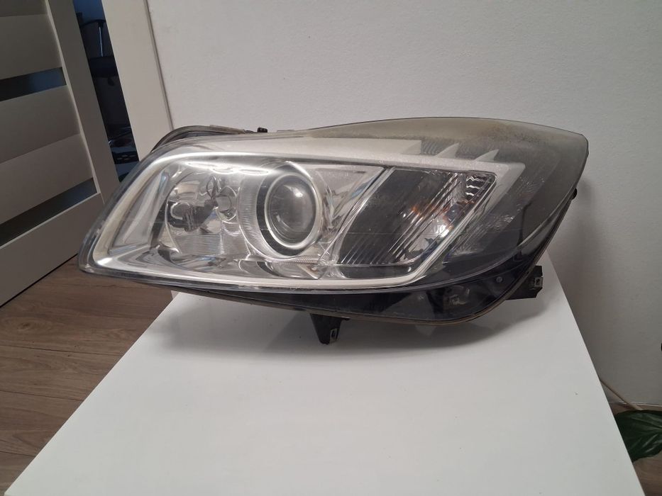 Vand faruri opel insignia