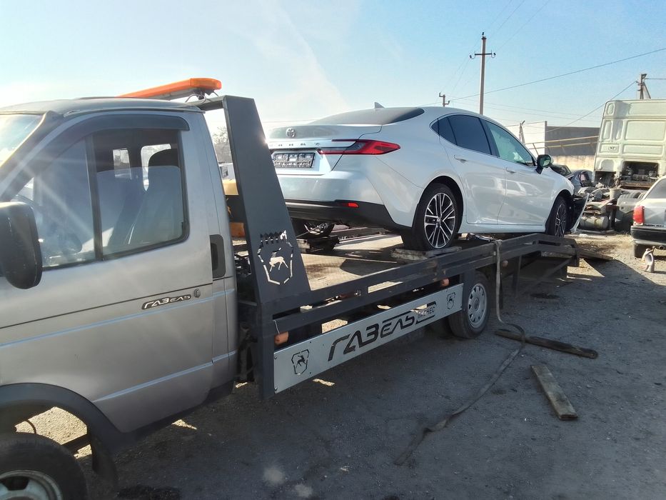 Услуги эвакуатор  кумшагал