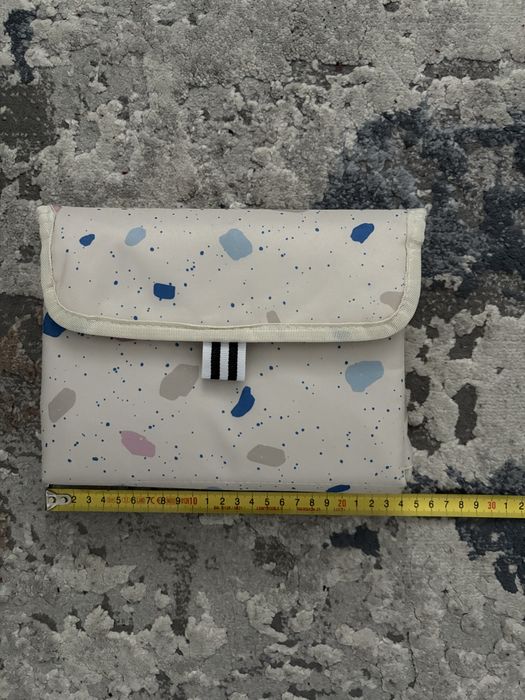 Saltea portabila pentru infasat