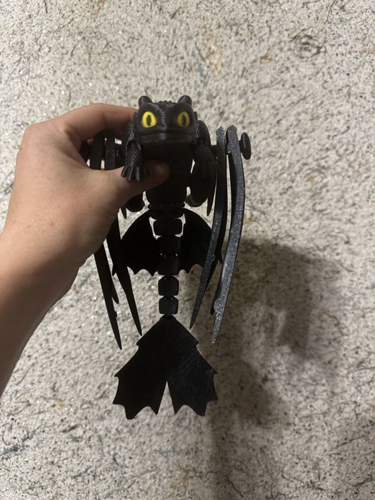 Подвижная игрушка дракон