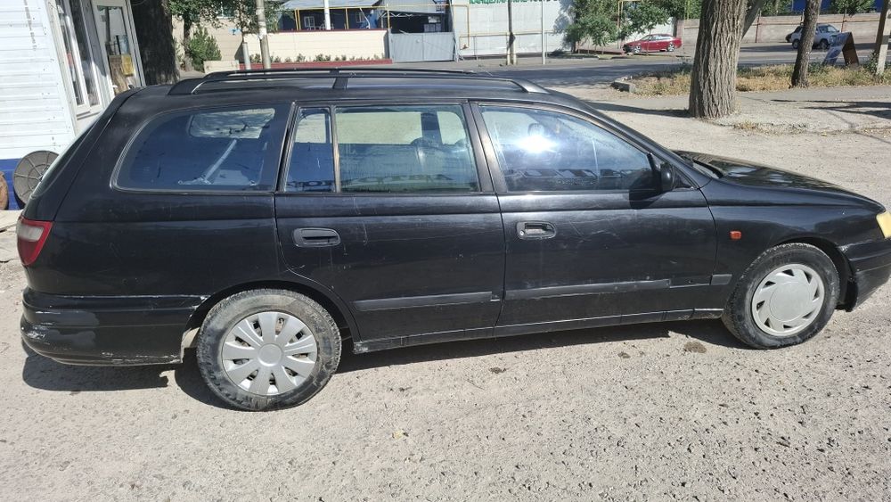 Таиота Карина Е 1995 газ