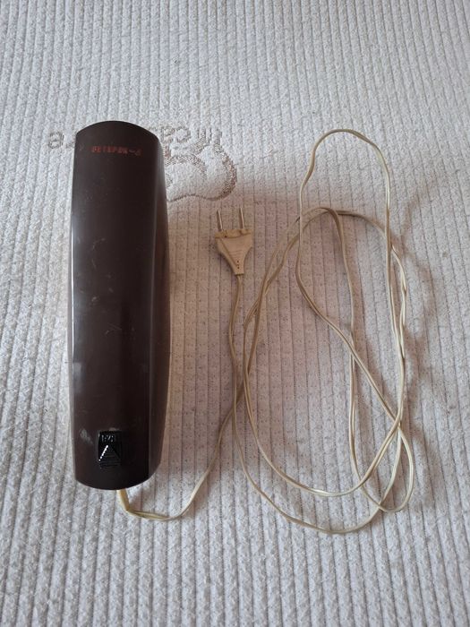 Електрическа четка за дрехи