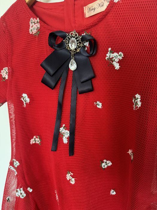 Продам детское платье от Deloras