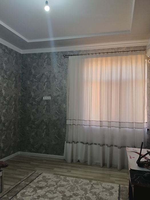 Продается двух этажный дом в махалле Мажнунтол