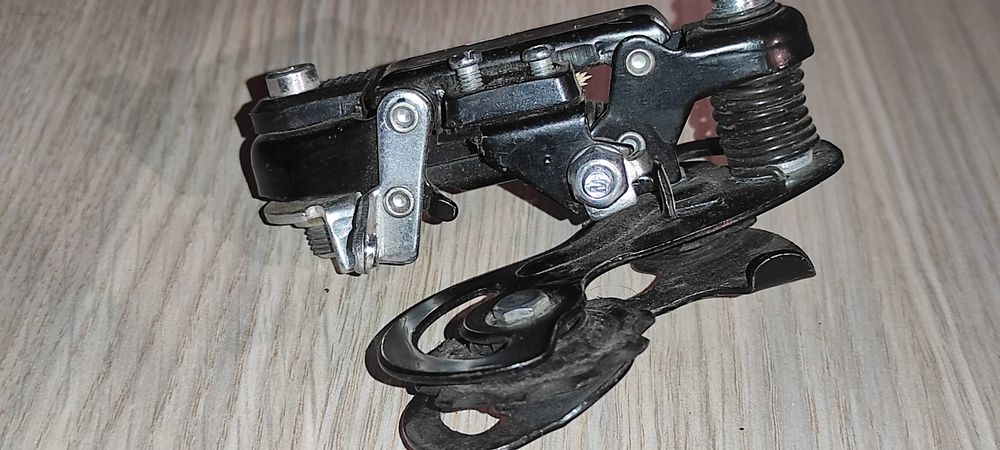 schimbator pt. pinioane bicicleta SUNRACE M2T pt. 6-7 pinioane patina mica pret 40 ron ( lipsa un surub pt. reglaj ( unde intra