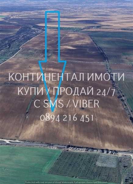 кодг 62815. Поземлен имот нива 16дка с лице на шосето 130м преди селото