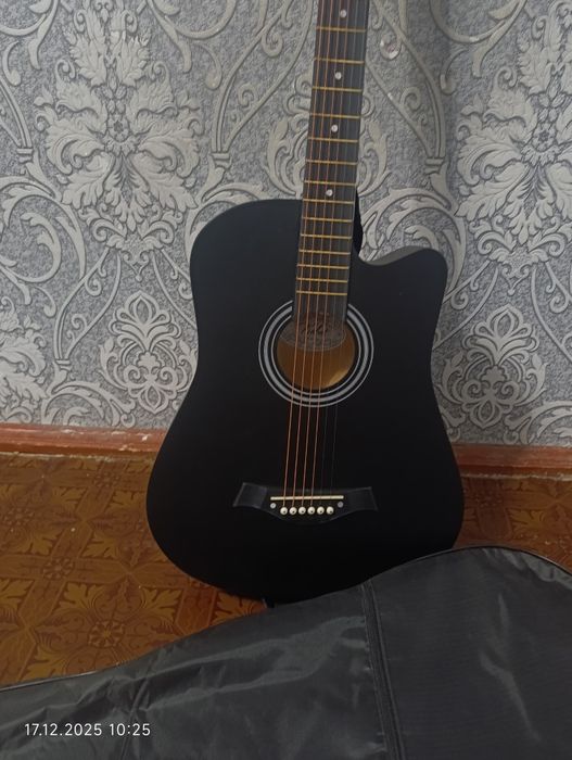 Gitara holati A'lo darajada