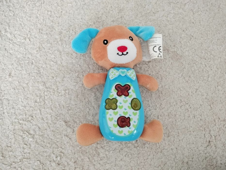 Jucărie muzicală în formă de cățel