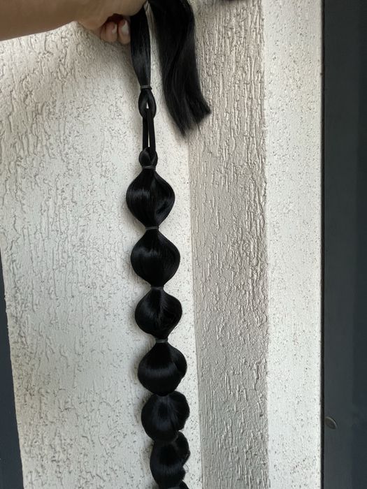 Coada de par lunga  bruneta eleganta