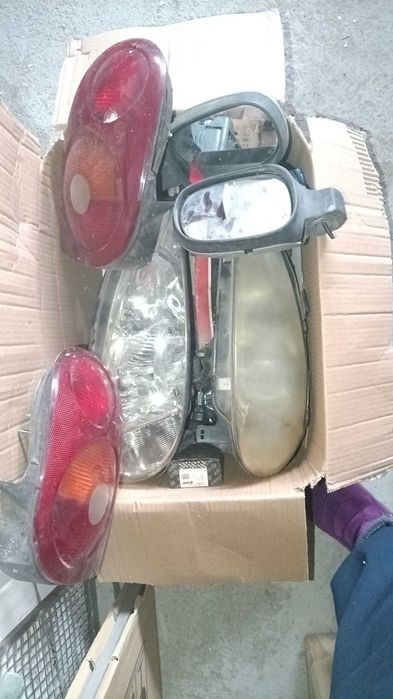 Piese Renault Megane 2000 faruri stopuri oglinzi