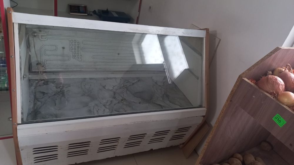 Магазинге қоятын холодильник