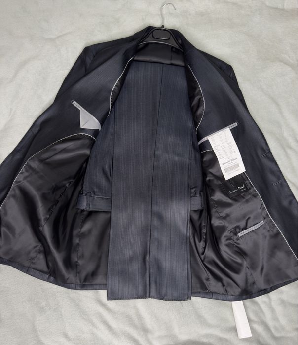 Продам  новый костюм