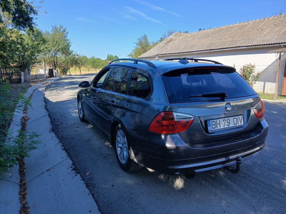 Vand bmw 320 ,2007,163 de cai distribuție in fata