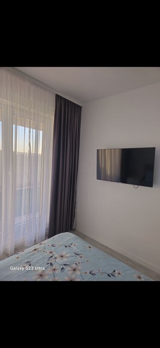 Tunari/Inchiriez Apartament cu grădină 2 camere 60mp  mobilat și utila