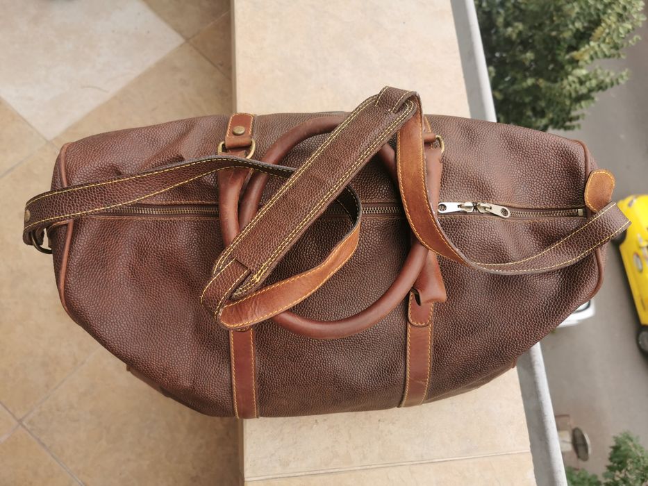 Geanta de voiaj (weekender/duffel) din piele texturată de la brandul Timberland