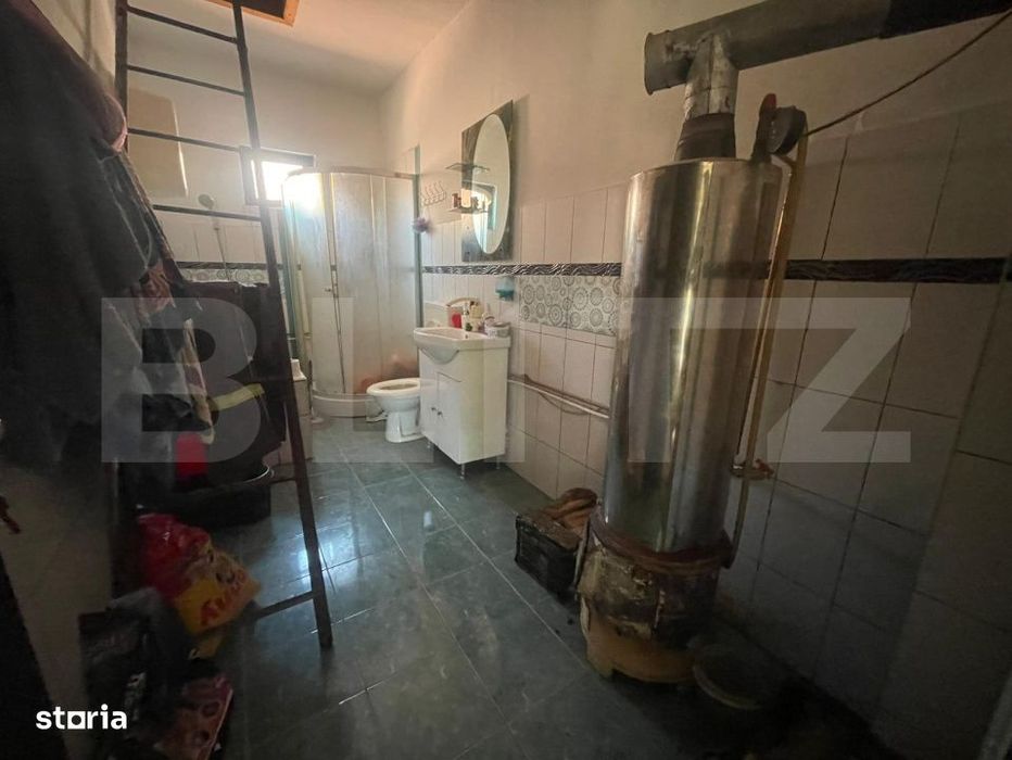 Casa cu 3 camere si un teren in suprafata de 6000 mp