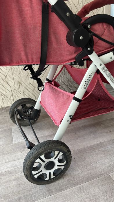 Продам коляску розовую